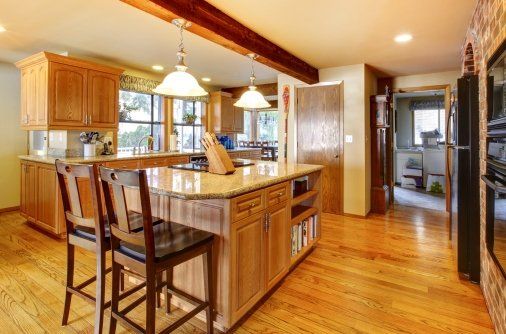 kitchen remodeling completed project with pub height center island